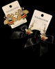 Designer Black Bowtie Bee Earrings with Pearl Detailing